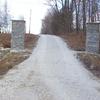 stone driveway gate piers and retaining wall.  pics. 1 of 3